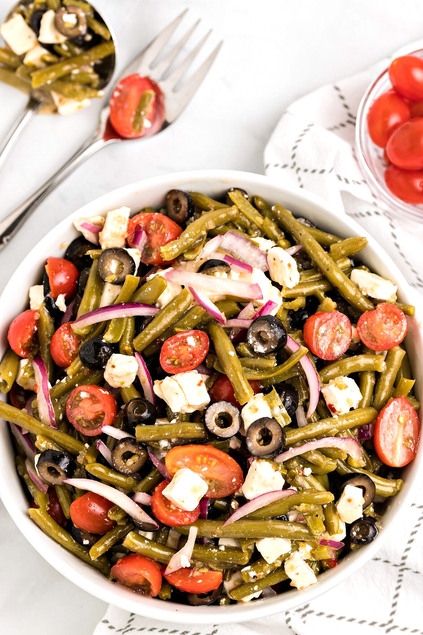 Green beans, cherry tomatoes, black olives, purple onions, feta cheese & Italian dressing